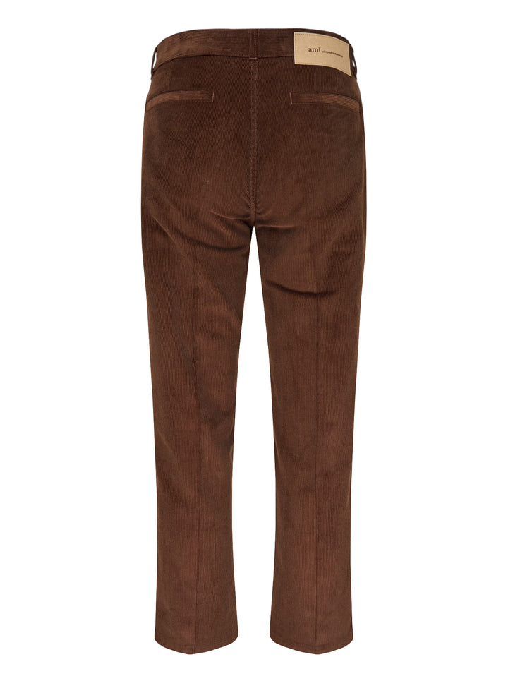 AMI Parisian Fit Trousers in brown fine-wale corduroy with a straight leg silhouette, structured waistband and twin button fastening, front view on white background - view 2