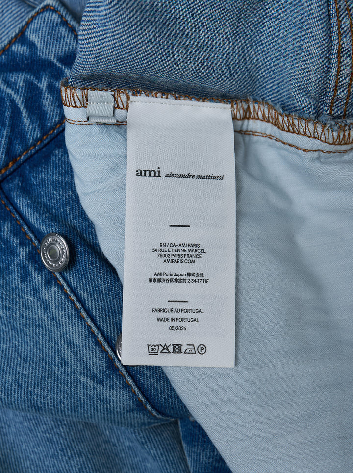 AMI Baggy Fit Jeans in light blue washed denim with wide-leg silhouette, button fly, and five-pocket design - view 3