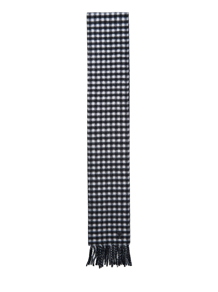 AMI Ami de Coeur black and white gingham check scarf with fringed ends, laid flat against a white background