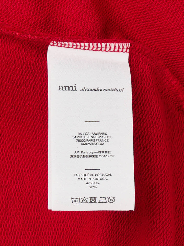AMI Paris Bicolor Crewneck Sweatshirt in red with cream contrast ribbed collar and cuffs, featuring an embroidered Ami de Cœur logo on the chest - view 4