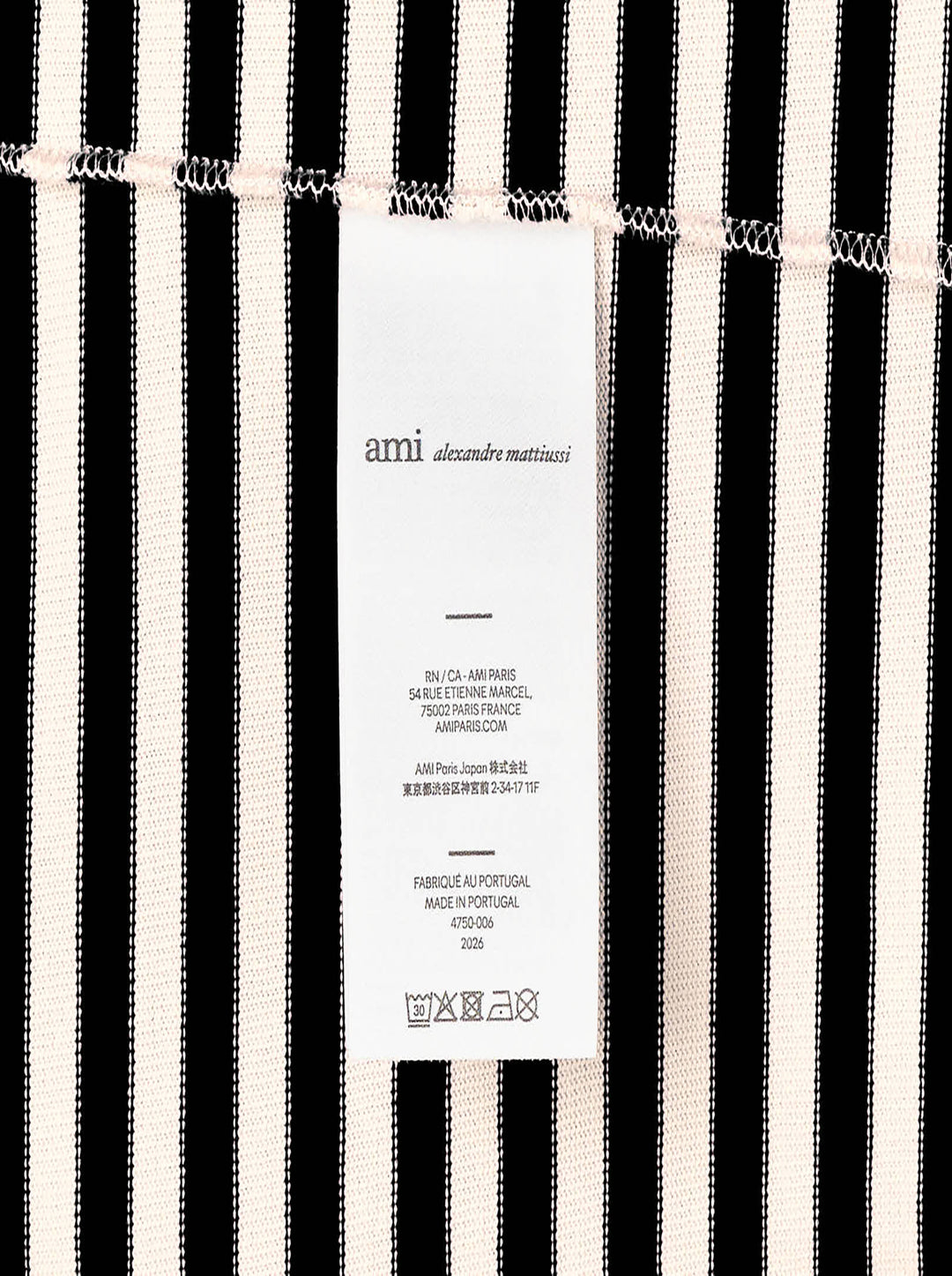 Ami Paris long sleeve crew neck tee in black and ivory horizontal Breton stripes with tonal Ami de Cœur chest logo embroidery - view 4