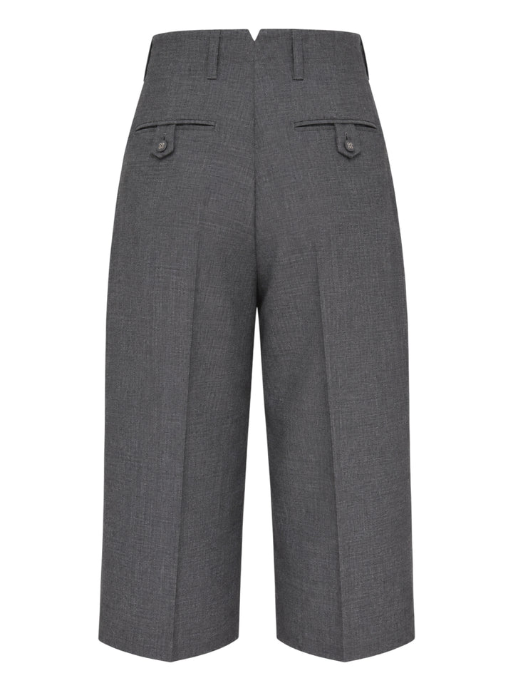 AMI Pleated Carrot Shorts in medium grey, featuring a high-rise waistband, double forward pleats, wide-leg carrot silhouette, and cuffed hem, displayed flat on a white background. - view 2