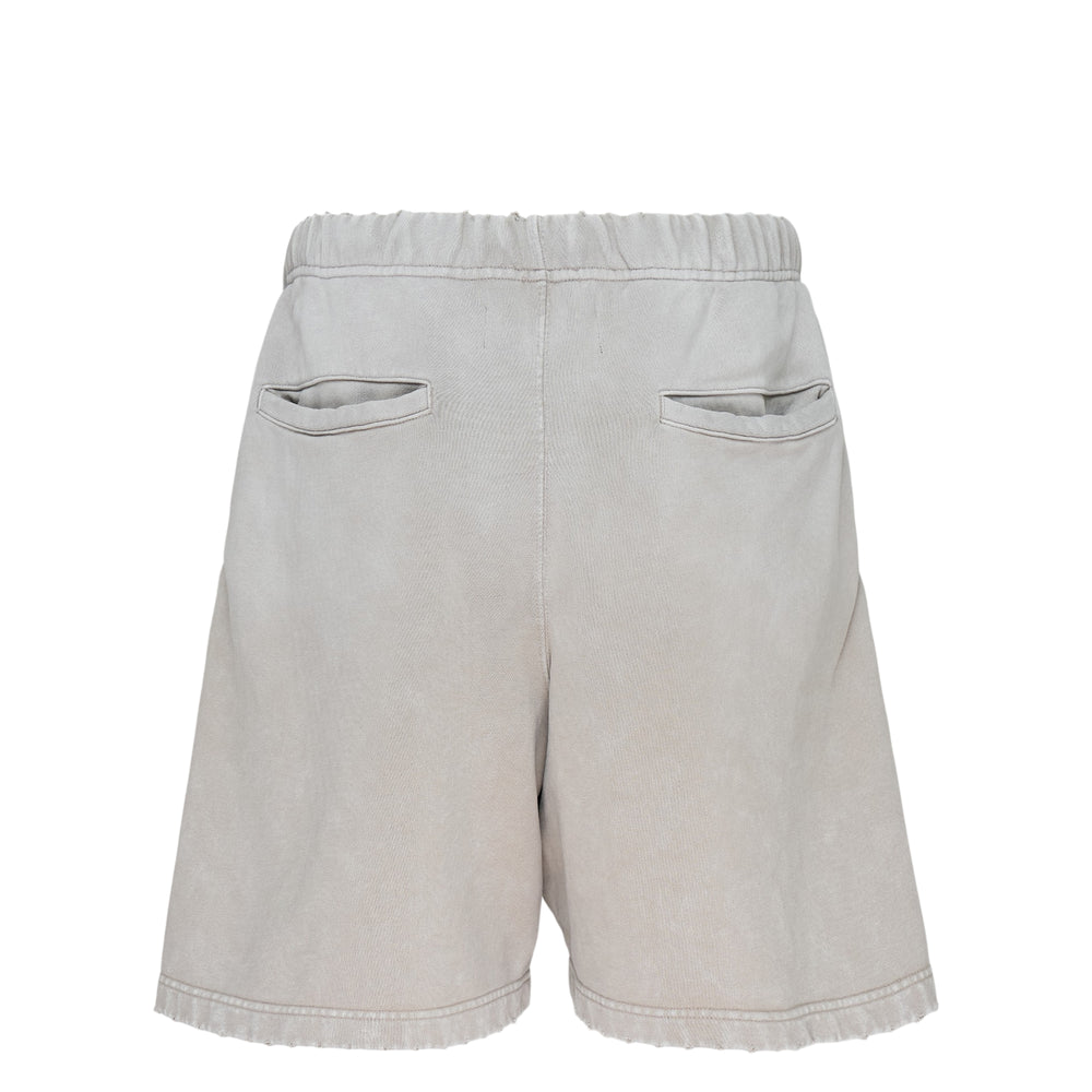 Mihara Yasuhiro French Terry Distressed Shorts in washed grey, featuring a relaxed wide-leg silhouette, elasticated drawstring waist, raw hem, and signature manufacturer-style label patch on the front - view 2