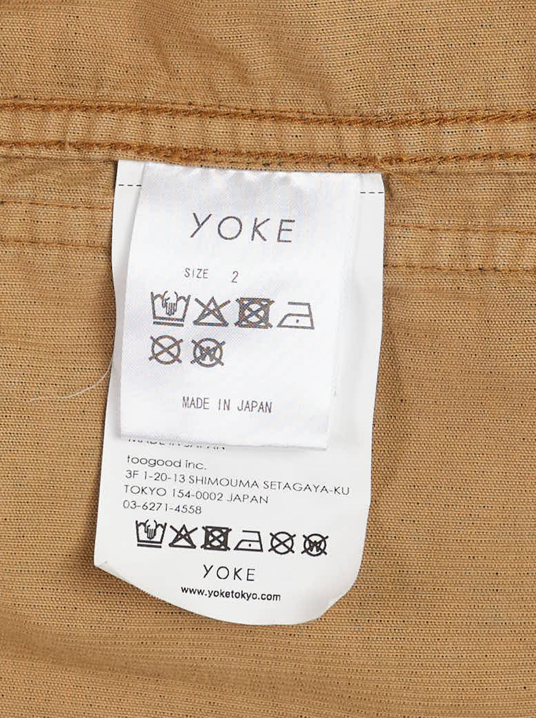 Yoke corduroy coverall jacket in washed olive-brown with four buttons, patch pockets and contrast orange stitching - view 4