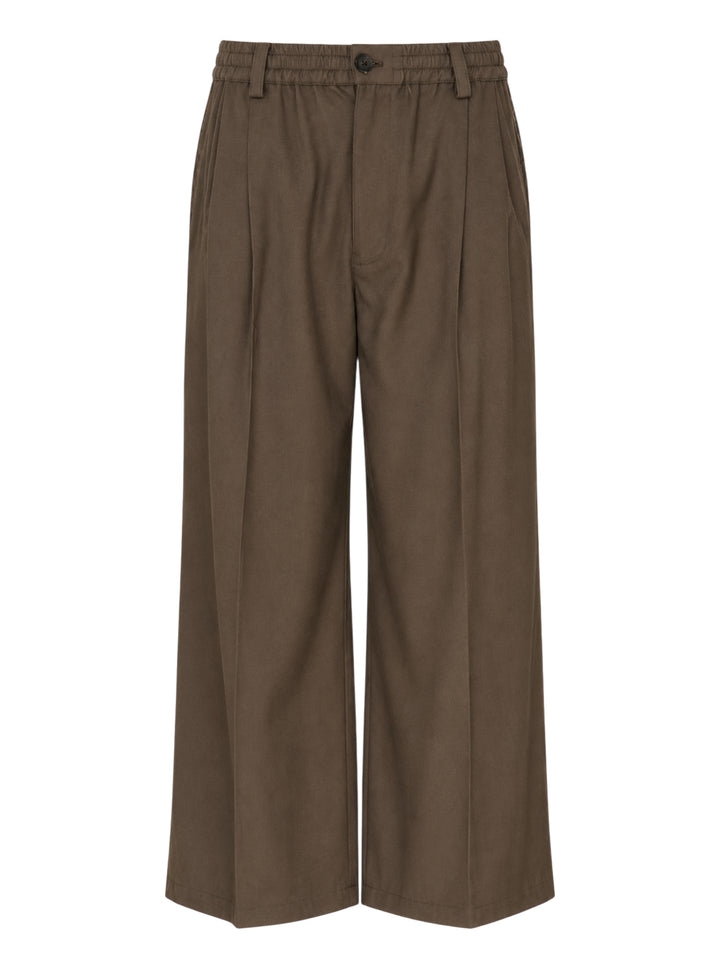 Brown wide-leg pleated trousers with an elasticated waistband, button closure and cropped hem, shown from the front
