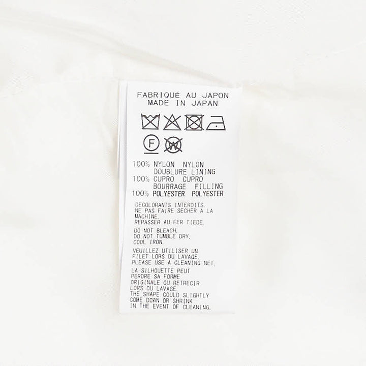 Yohji Yamamoto Padded Triple Collar Blouse in off-white, featuring layered fanned collar leaves, tonal button-front placket, and dual angular chest pocket flaps - view 3