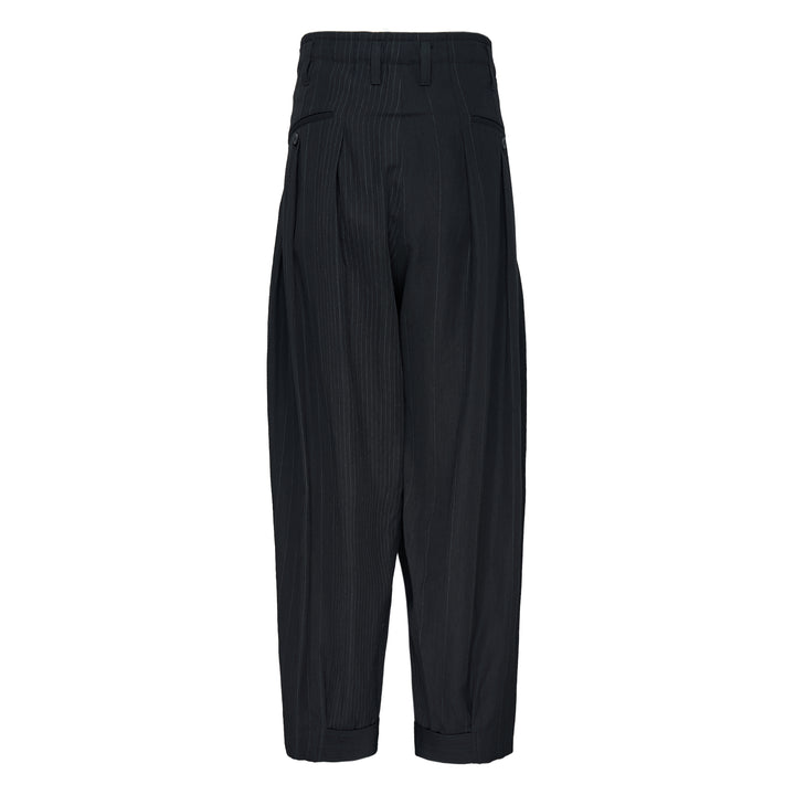 Yohji Yamamoto Hem Tab Wide Tuck Pants in black pinstripe, featuring a high-rise waistband, deep forward pleats, voluminous wide-leg silhouette, and buttoned cuff tab detailing at the hem - view 2