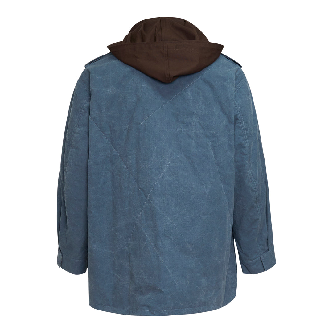 Yohji Yamamoto Hooded Stitch Blouson Coat in slate blue waxed canvas with contrast dark brown detachable hood, centre front zip closure, chest zip pocket, flap patch pockets, and drawstring hem