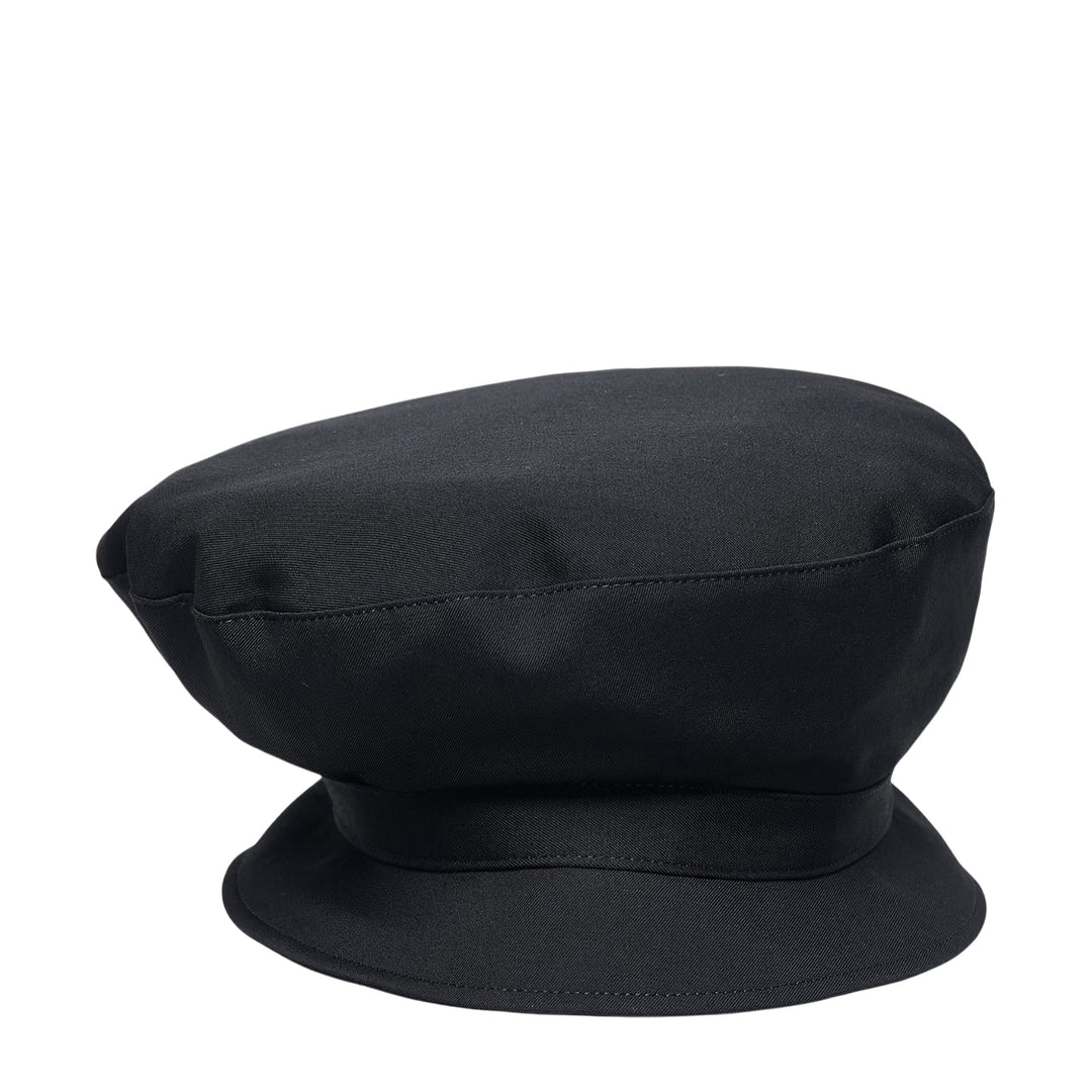 Yohji Yamamoto black bucket beret hat with oversized rounded crown, tonal seam detailing, and a flat structured peaked brim, shown on a white background