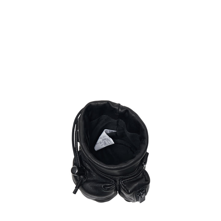 Y's 2 Way Mini Purse in black leather with long adjustable webbing crossbody strap, drawstring top closure, and exterior zip pocket, shown on white background - view 3