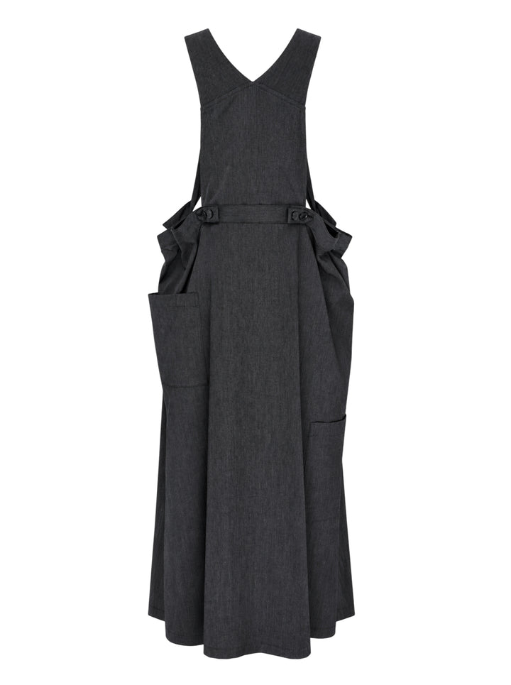 Y's charcoal grey wool salopette dress with crossover bib, buckled straps and oversized side pockets, shown from the front - view 2
