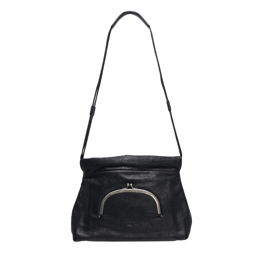 Y's black crinkled leather shoulder bag with arched silver-tone kiss-lock clasp pocket and adjustable slim leather strap, shown against a white background