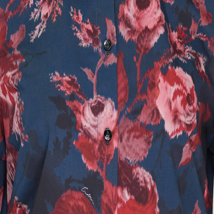Erdem navy cotton poplin short sleeve blouse with large-scale crimson and blush rose floral print, flutter ruffle cuffs, and dark button-through front placket