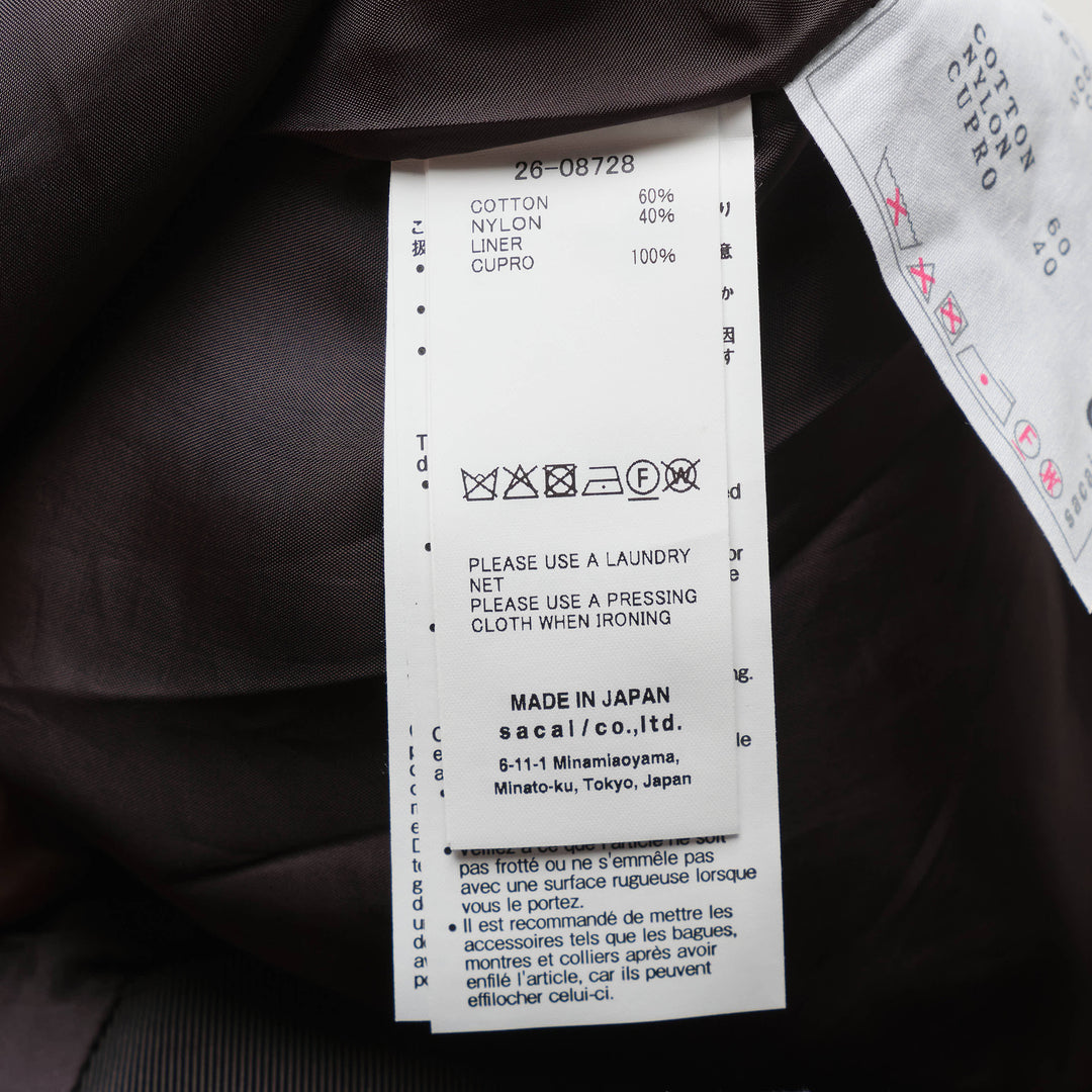 sacai Grosgrain Belted Wide-Leg Pants in black — high-waist pleated culottes with cargo patch pockets and integrated grosgrain belt, front view - view 3