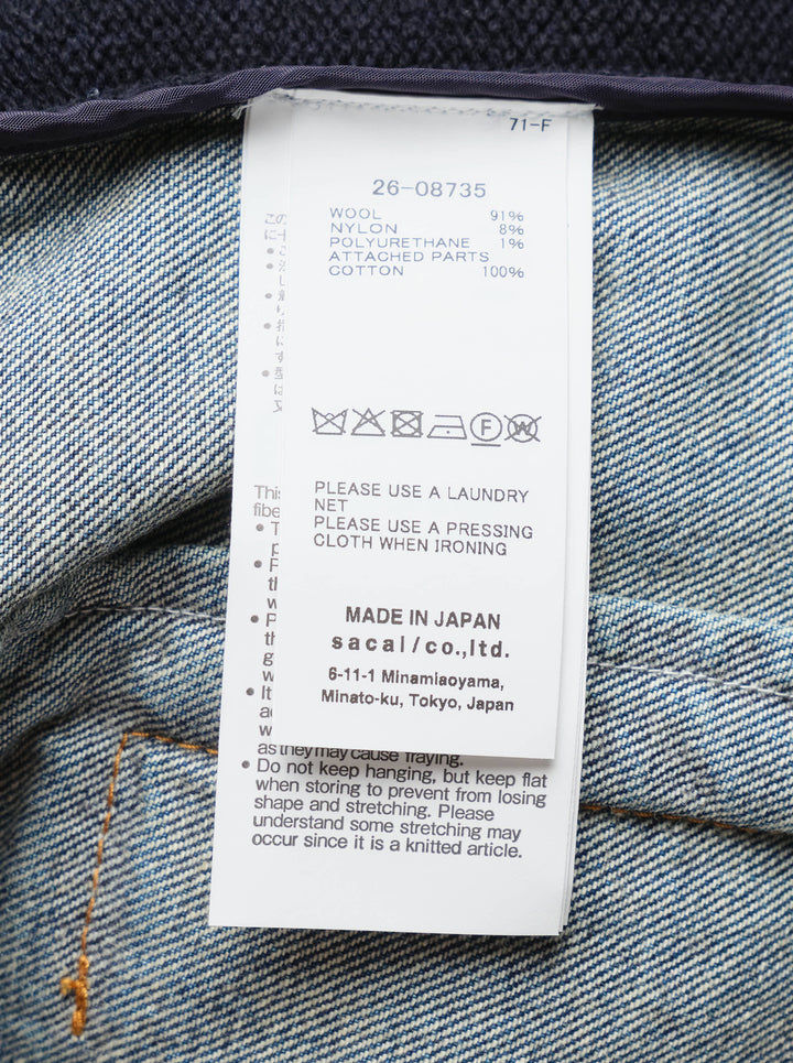 sacai Denim Contrast Wool Knit Cardigan in navy, featuring an indigo denim collar, double chest patch pockets with snap closures, and a button-front fastening - view 3