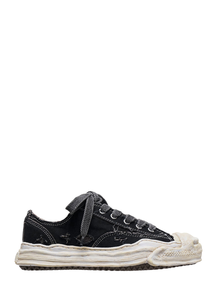 Mihara Yasuhiro Hank black distressed canvas low-top sneaker with oversized laces and a melted-effect off-white sole, side view