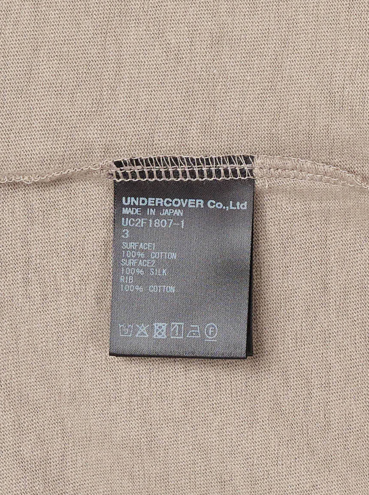 Undercover Shoulder Panel Tee in taupe with satin shoulder panels, chest pocket and knotted ribbon tie at the back neckline - view 3