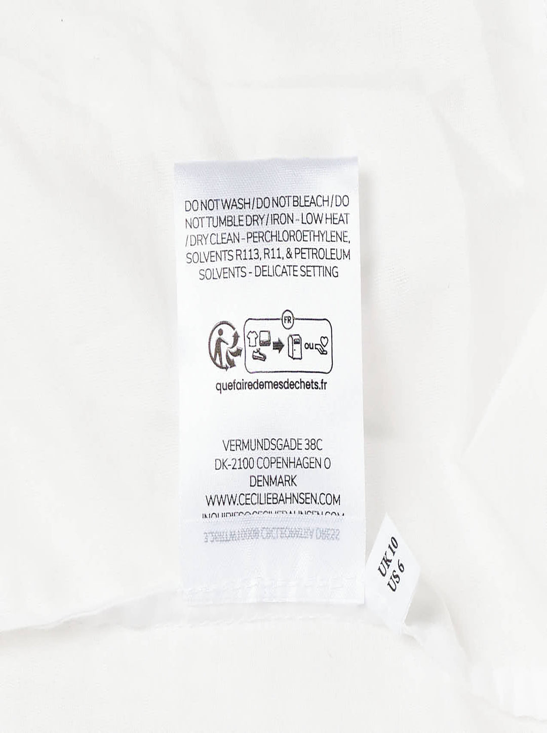 Cecilie Bahnsen Floratini Matelassé Midi Skirt in white, displayed flat, showing a voluminous A-line silhouette with an all-over raised jacquard texture and elasticated waistband - view 4