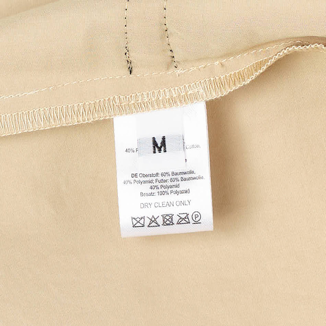 Hisu Park Savy Drawstring Shirt in beige cotton with sweeping black tulle ruffle appliqué wave detailing across the front and adjustable drawstring hem ties - view 9