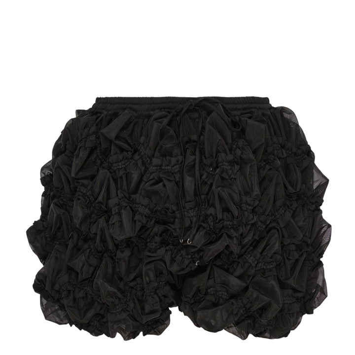 Hisu Park Glass Shorts in black — heavily ruffled organza-effect mini shorts with elasticated waistband, drawstring tie, and smocked detailing throughout