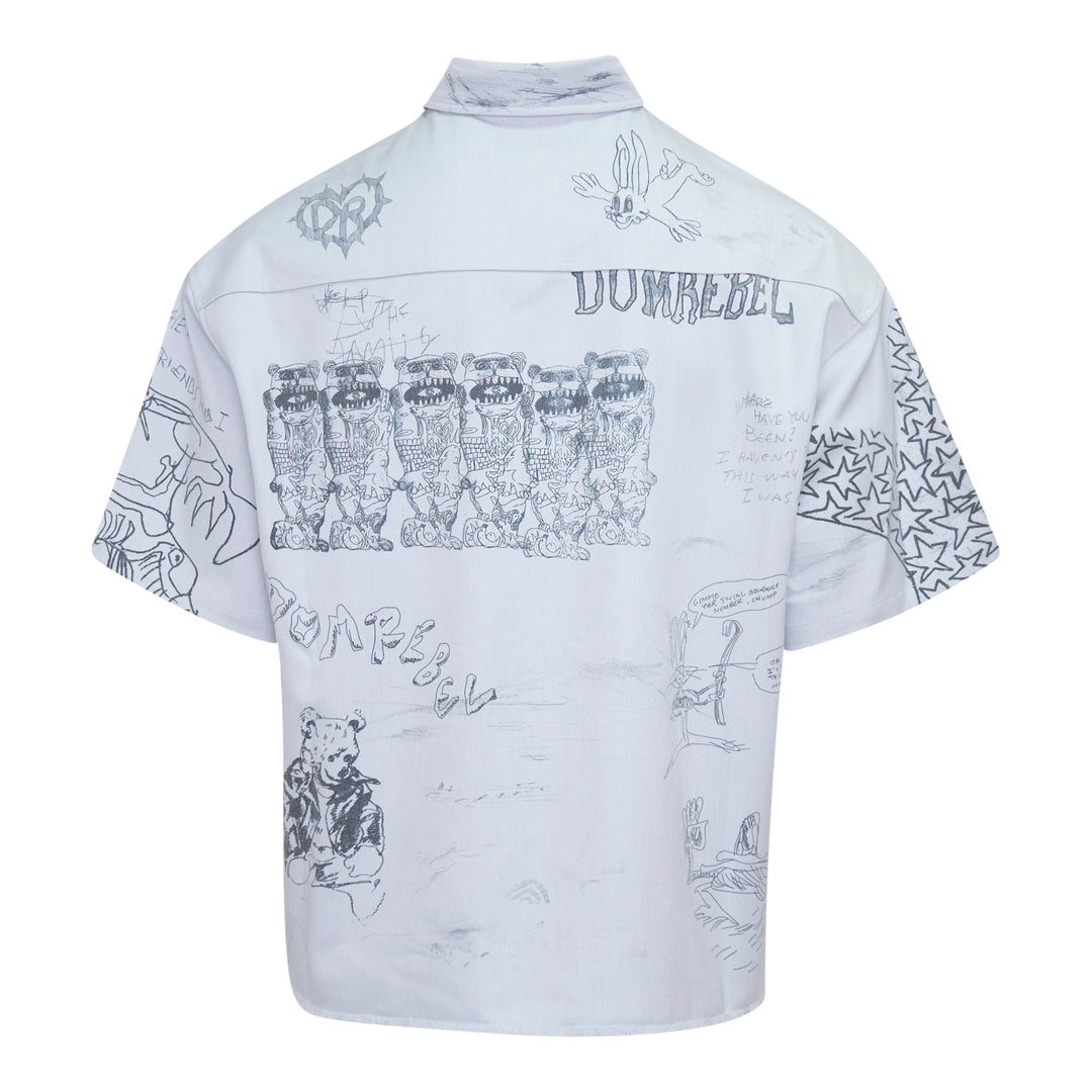 Domrebel short sleeve button-up shirt in light blue with all-over hand-drawn graffiti sketch print featuring cartoon characters, star motifs, and hand-lettered text phrases