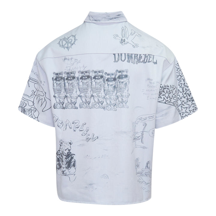 Domrebel short sleeve button-up shirt in light blue with all-over hand-drawn graffiti sketch print featuring cartoon characters, star motifs, and hand-lettered text phrases