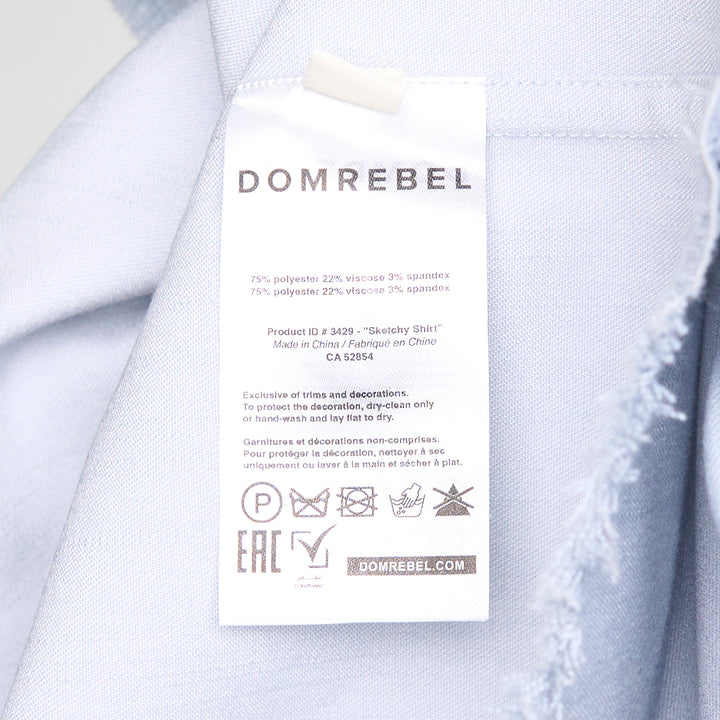 Domrebel short sleeve button-up shirt in light blue with all-over hand-drawn graffiti sketch print featuring cartoon characters, star motifs, and hand-lettered text phrases