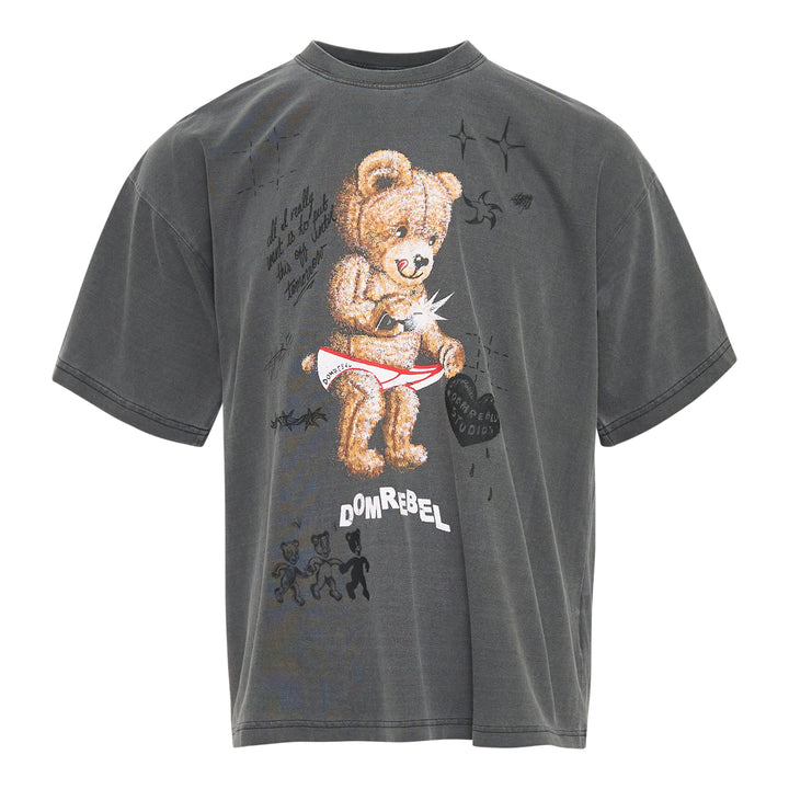 Domrebel washed grey oversized graphic tee featuring a large teddy bear in briefs, hand-scrawled typography, star and barbed wire motifs, and Domrebel Studios branding