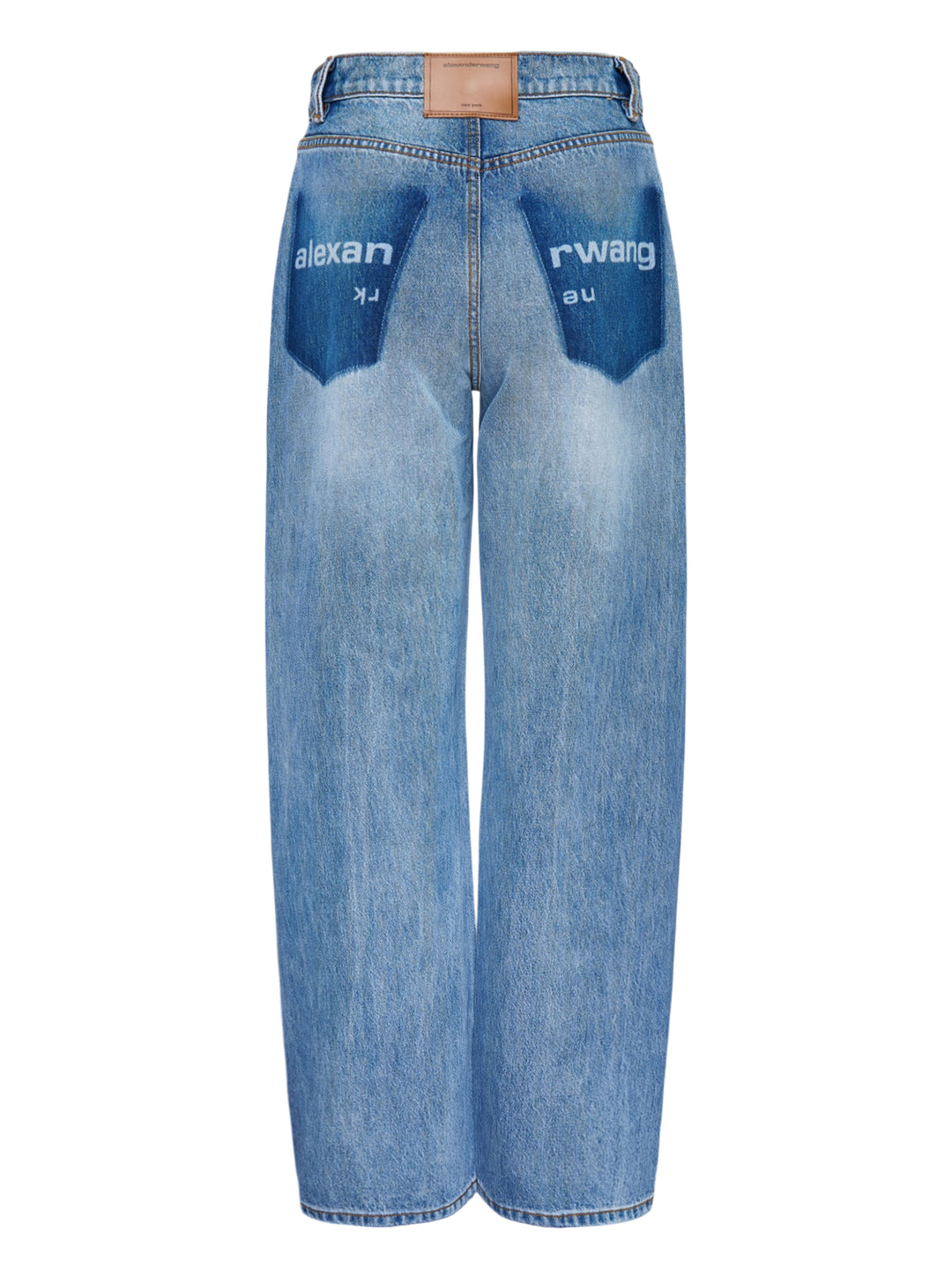 Alexander Wang Float Jeans in washed mid-blue denim with a high rise and curved twisted-seam leg, shown from the front - view 2