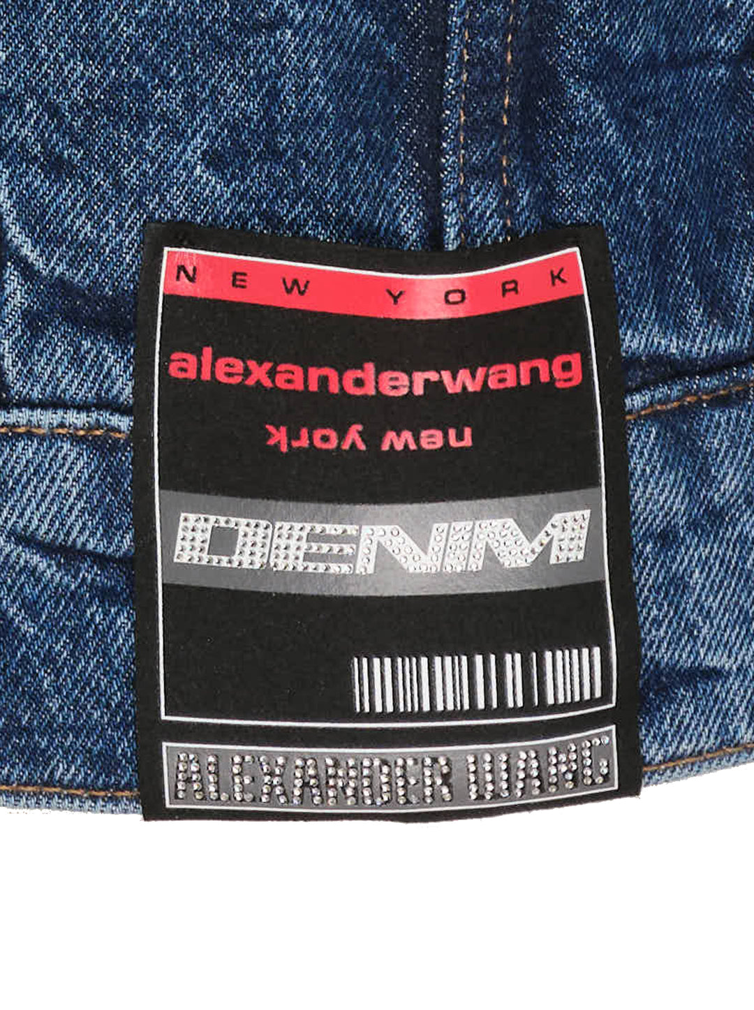 Alexander Wang oversized trucker jacket in washed blue denim with chest flap pockets, button front and AW logo tape on the sleeve - view 3