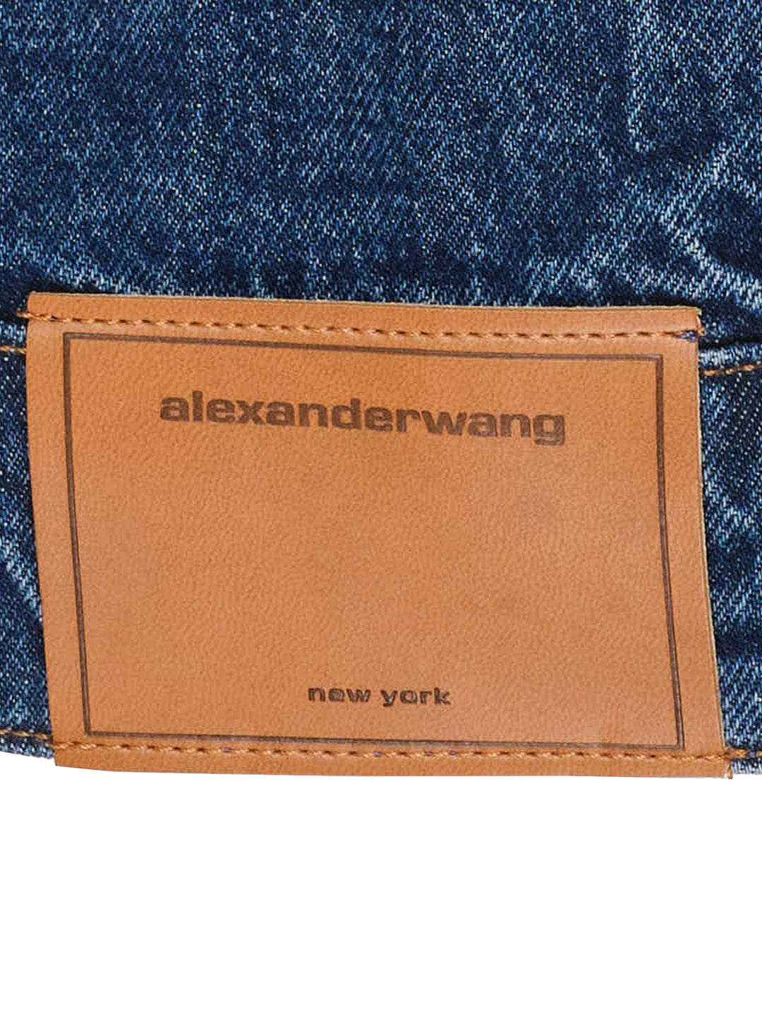 Alexander Wang oversized trucker jacket in washed blue denim with chest flap pockets, button front and AW logo tape on the sleeve - view 5