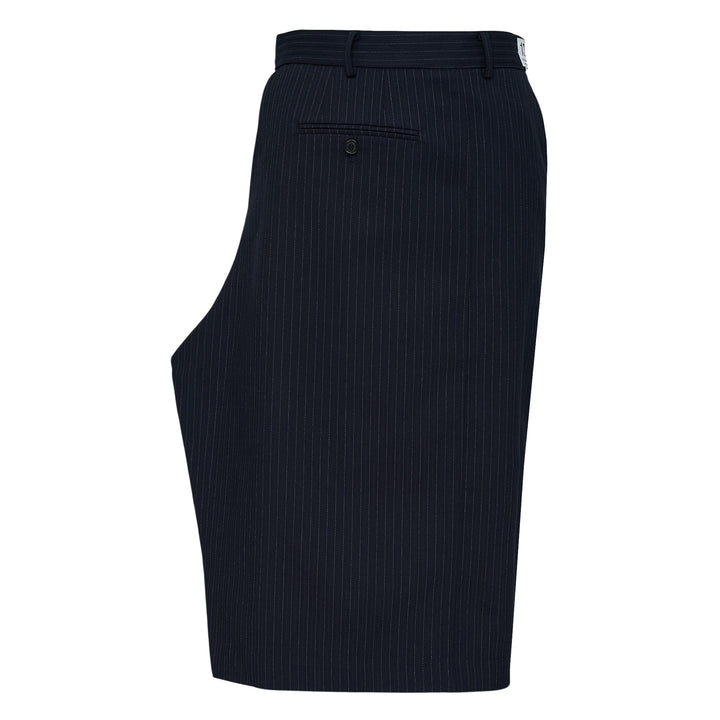 RE;CODE Stripe Side Drape Structured Skirt in navy pinstripe, shown from the side, featuring a tailored silhouette with a draped panel, belt loops, back button pocket, and woven brand label at the waistband