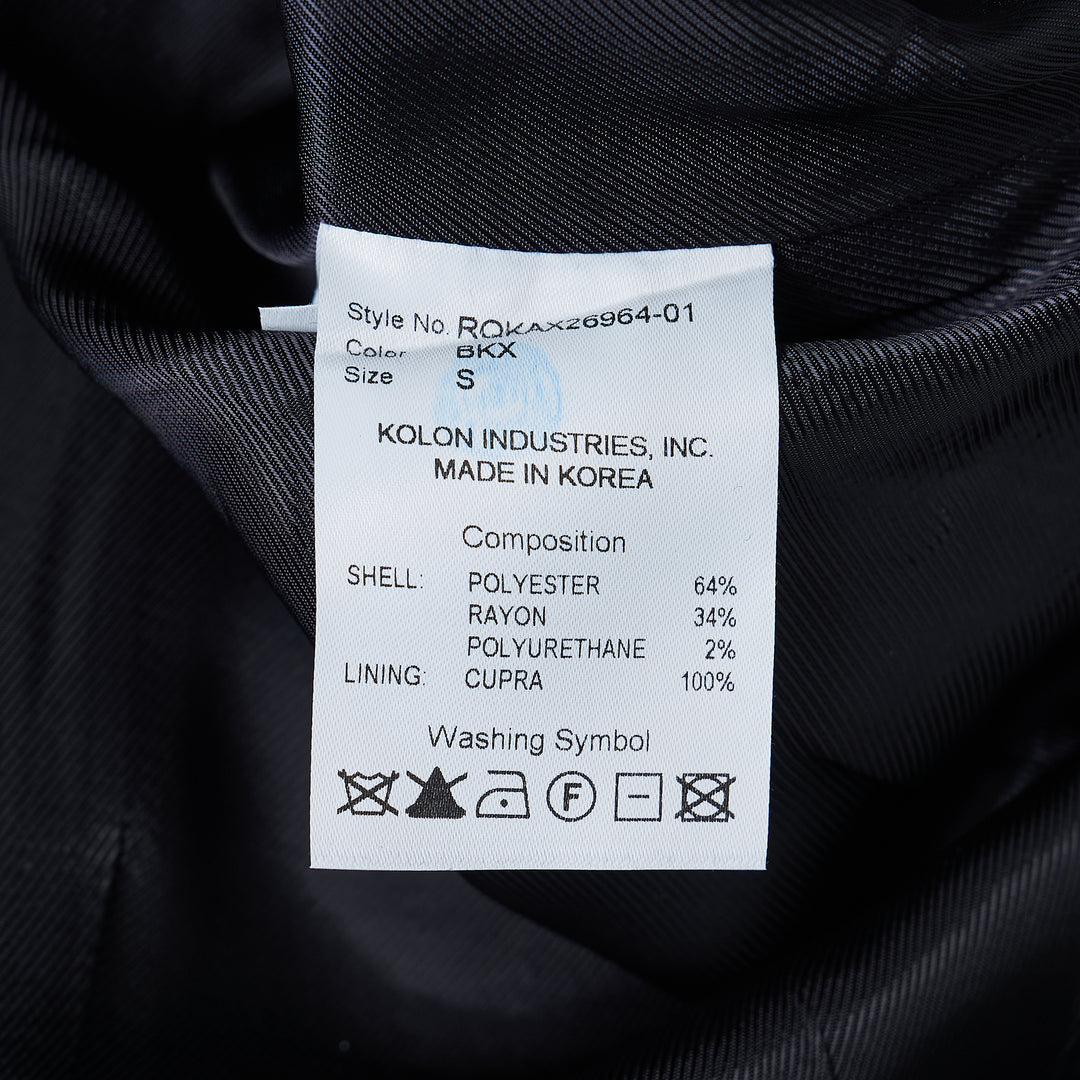 RE;CODE Stripe Side Drape Structured Skirt in navy pinstripe, shown from the side, featuring a tailored silhouette with a draped panel, belt loops, back button pocket, and woven brand label at the waistband