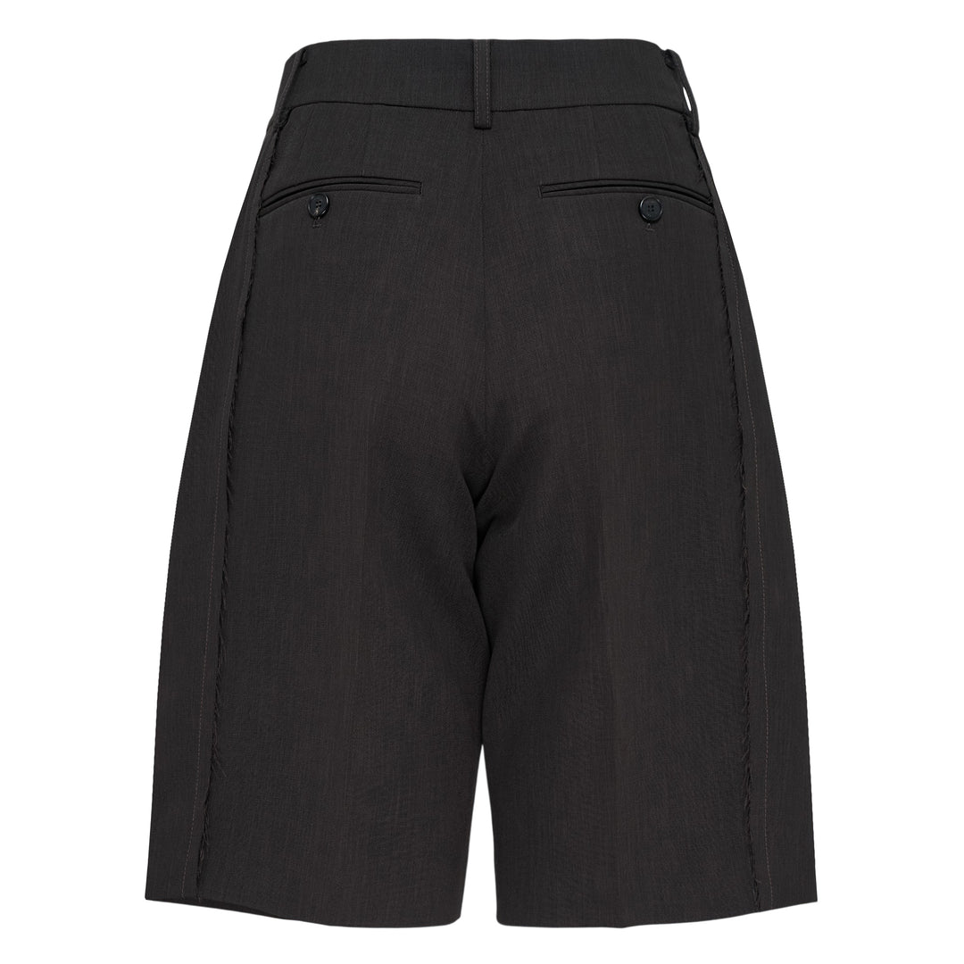 RE;CODE pleated tailored shorts in charcoal, featuring a high waist, double front pleats, wide-leg silhouette, and woven brand label at the waistband