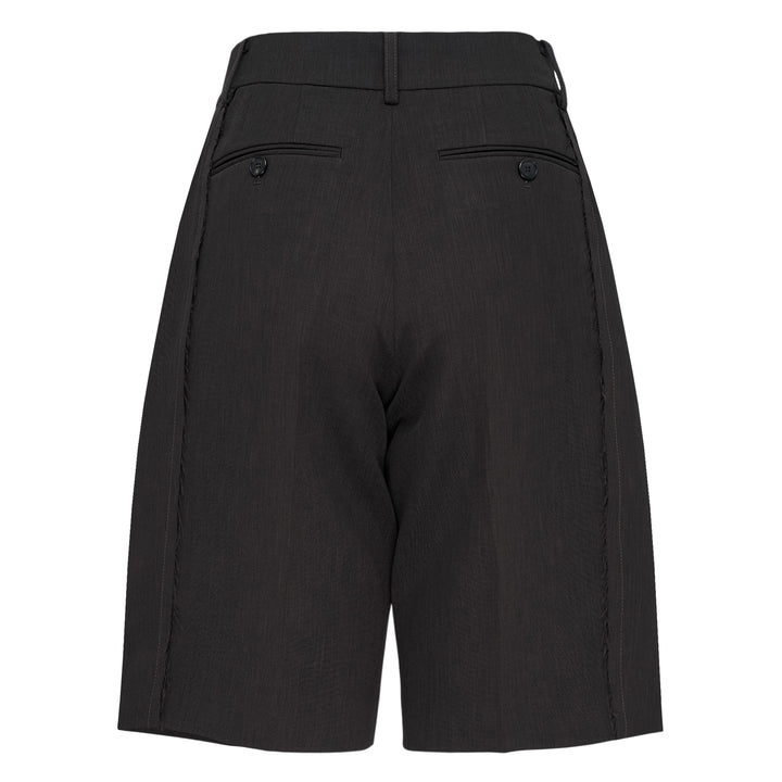 RE;CODE pleated tailored shorts in charcoal, featuring a high waist, double front pleats, wide-leg silhouette, and woven brand label at the waistband
