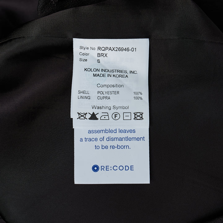 RE;CODE pleated tailored shorts in charcoal, featuring a high waist, double front pleats, wide-leg silhouette, and woven brand label at the waistband