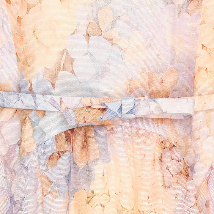 Zimmermann Valiant Tucked Midi Dress in a pastel hydrangea floral print, featuring a structured sweetheart bustier bodice, adjustable spaghetti straps, a self-belt at the waist, and an A-line skirt with ivory lace scrollwork trim at the hem
