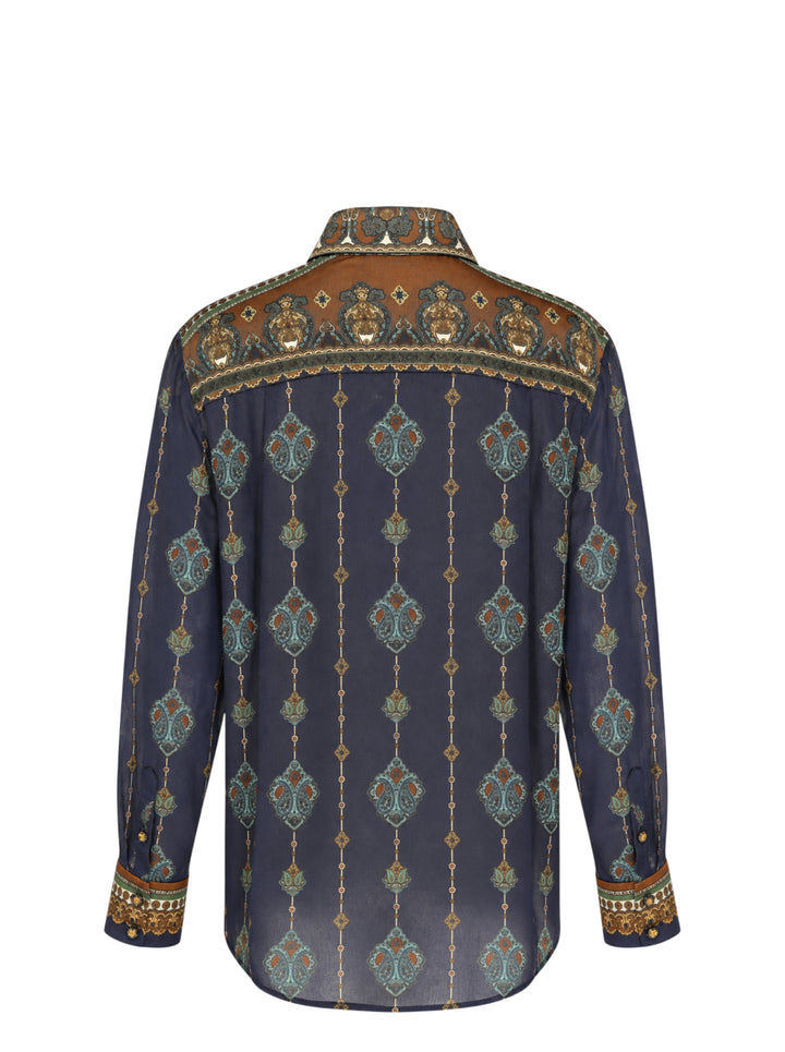 Zimmermann Satin Scarf Blouse in navy and bronze paisley print with self-tie bow collar, tassel ends, and button-through front placket - view 2