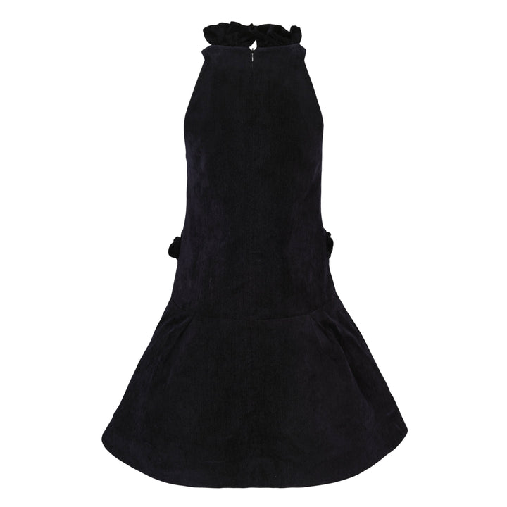 SHUSHU/TONG dark navy velvet halter mini dress with bow detail at chest, ruffled neckline and pocket trim, and drop-waist flared skirt — front view on white background