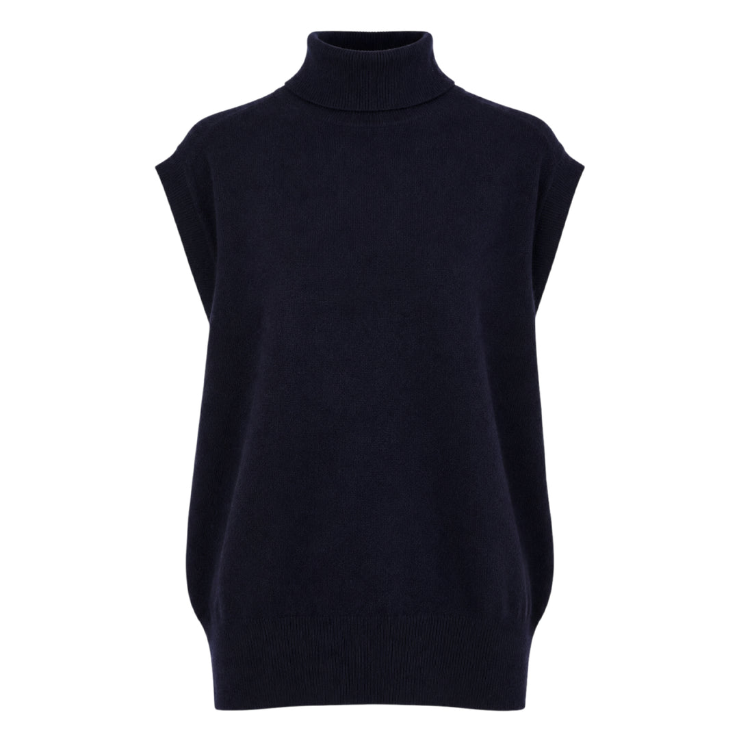 Sofie D'Hoore sleeveless turtleneck knit top in deep navy, featuring a ribbed roll neck, extended cap shoulders, and a relaxed boxy silhouette