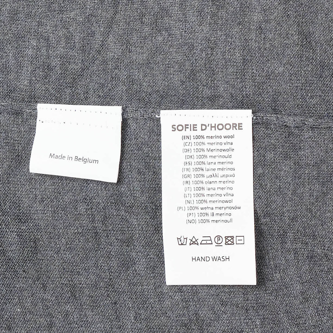 Sofie D'Hoore short sleeve jersey knit top in heather grey, featuring a relaxed oversized silhouette, ribbed crewneck, and curved hem with side vents