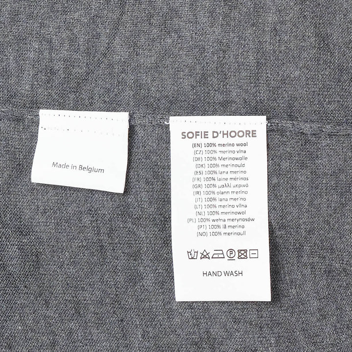 Sofie D'Hoore short sleeve jersey knit top in heather grey, featuring a relaxed oversized silhouette, ribbed crewneck, and curved hem with side vents