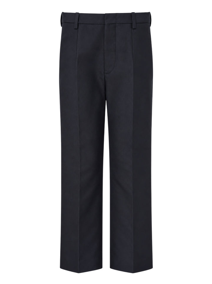 Sofie D'Hoore navy flat front trousers with a pressed centre crease and straight leg, shown from the front