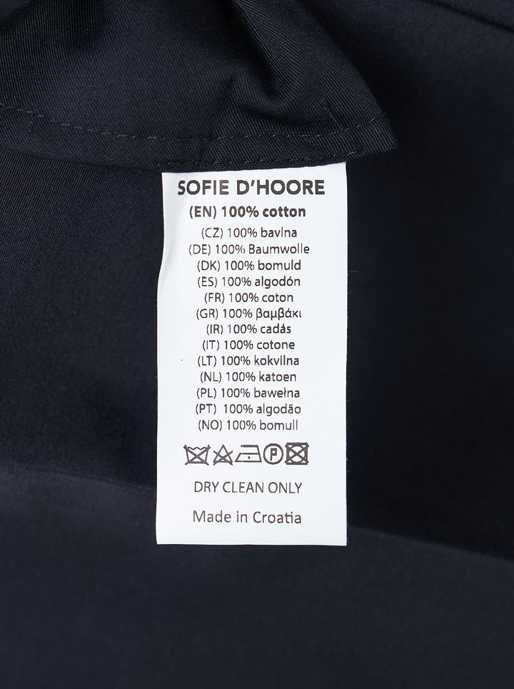 Sofie D'Hoore navy flat front trousers with a pressed centre crease and straight leg, shown from the front - view 3