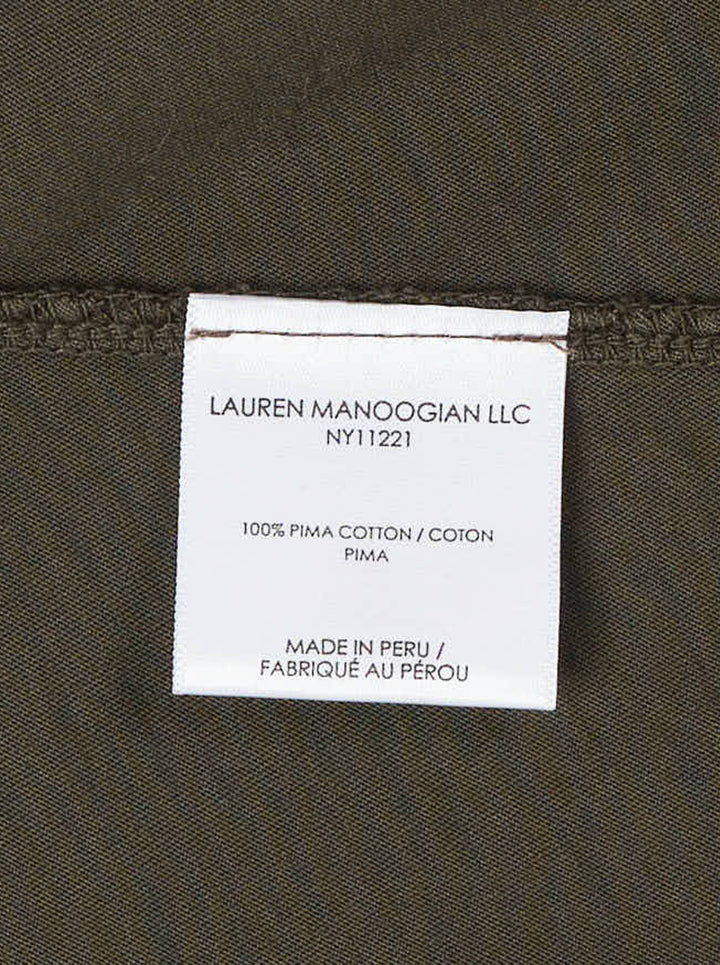 Lauren Manoogian Bias Baby Tee, a short sleeve crewneck t-shirt in a washed brown jersey, shown flat from the front - view 3