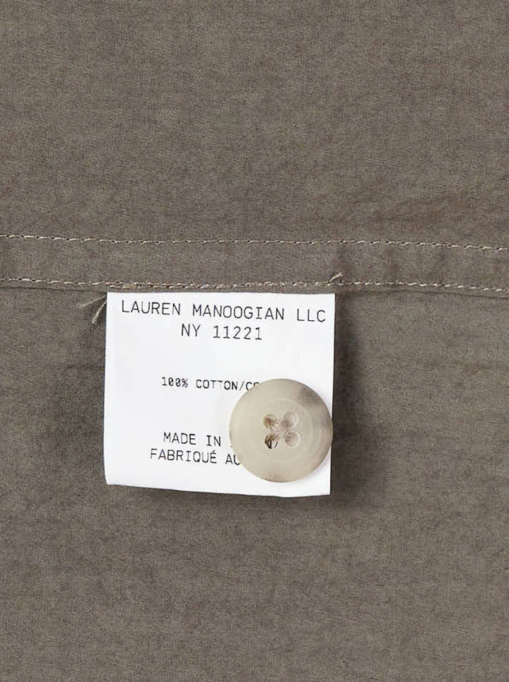 Lauren Manoogian Lap Shirt in earthy brown with a V-neck, single button closure and long sleeves, shown flat from the front - view 3