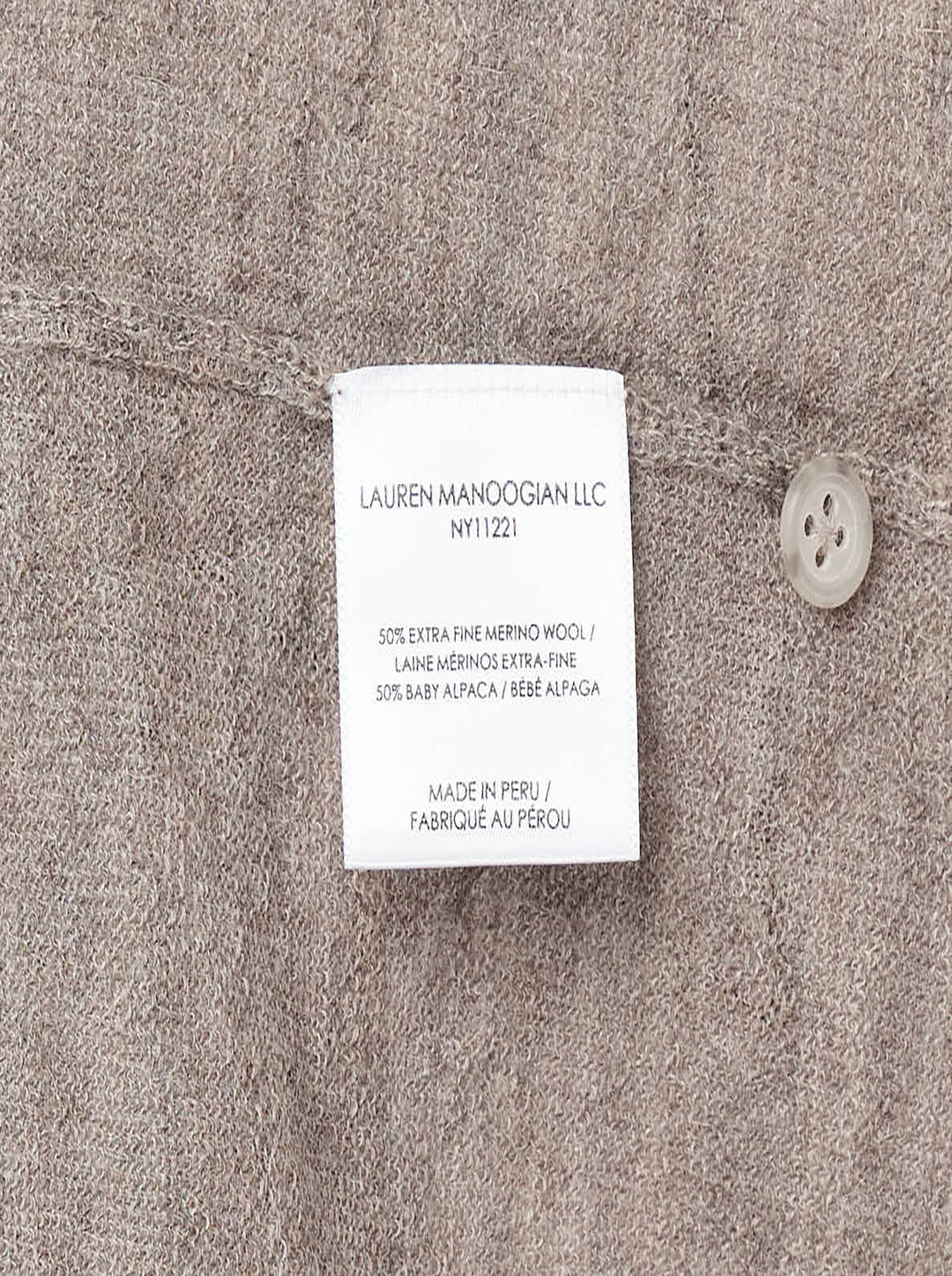 Lauren Manoogian Fine Henley knit top in heathered taupe with short sleeves, a round neck, and a partial button placket, shown flat on a white background - view 3