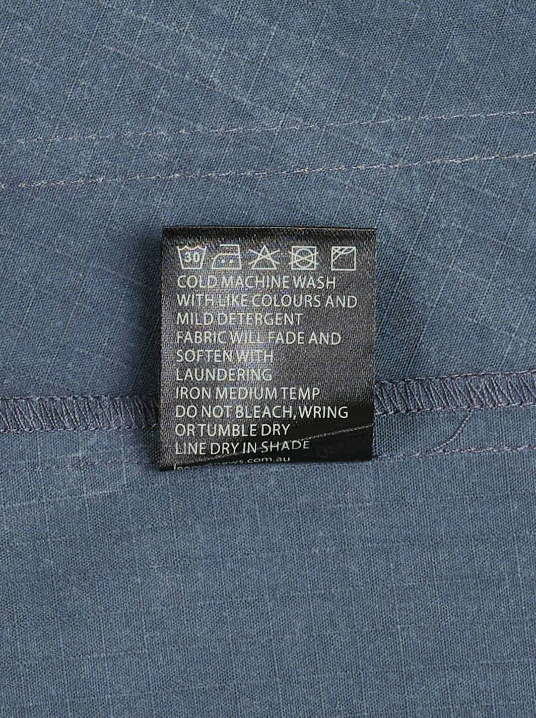 Lee Matthews Cecil Cotton Apron Dress in washed blue denim, featuring a V-neckline, A-line silhouette, contrast topstitching, and two front patch pockets - view 3