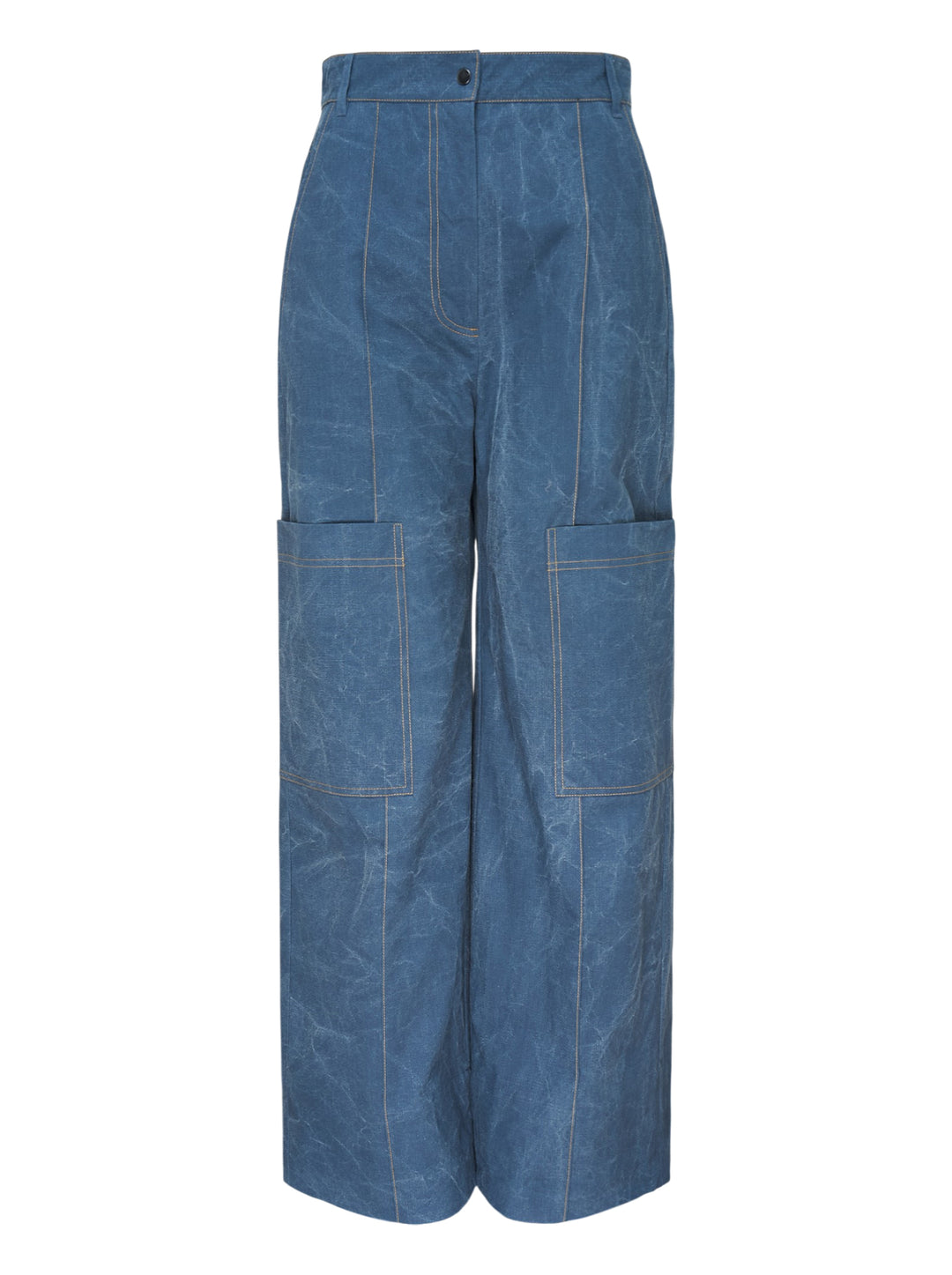 Lee Mathews Cecil Cotton Pants in crinkle-textured faded indigo blue, featuring a wide-leg silhouette, oversized patch pockets, and contrast topstitching throughout