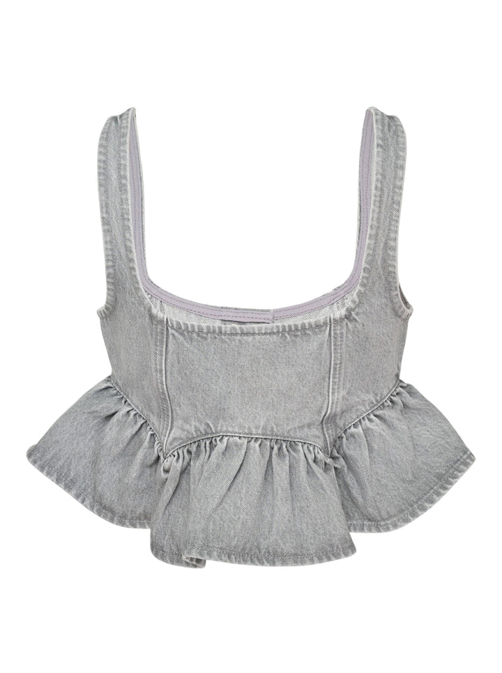 Ganni Rigid Denim Flounce Top in light grey wash, featuring a structured seamed bodice, three branded silver snap buttons at the centre front, wide shoulder straps, scoop neckline, and a gathered peplum ruffle hem - view 2